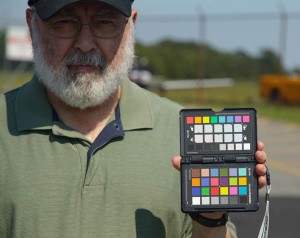 Cemal holding ColorChecker Passport